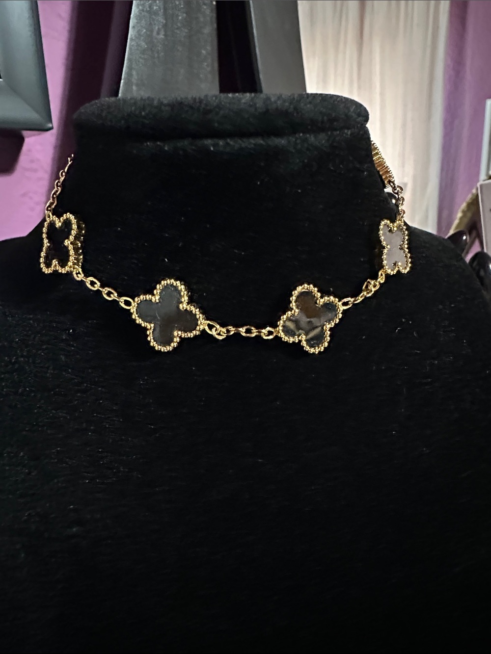 Gold Four-Leaf Clover Station Bracelet with Black Stones